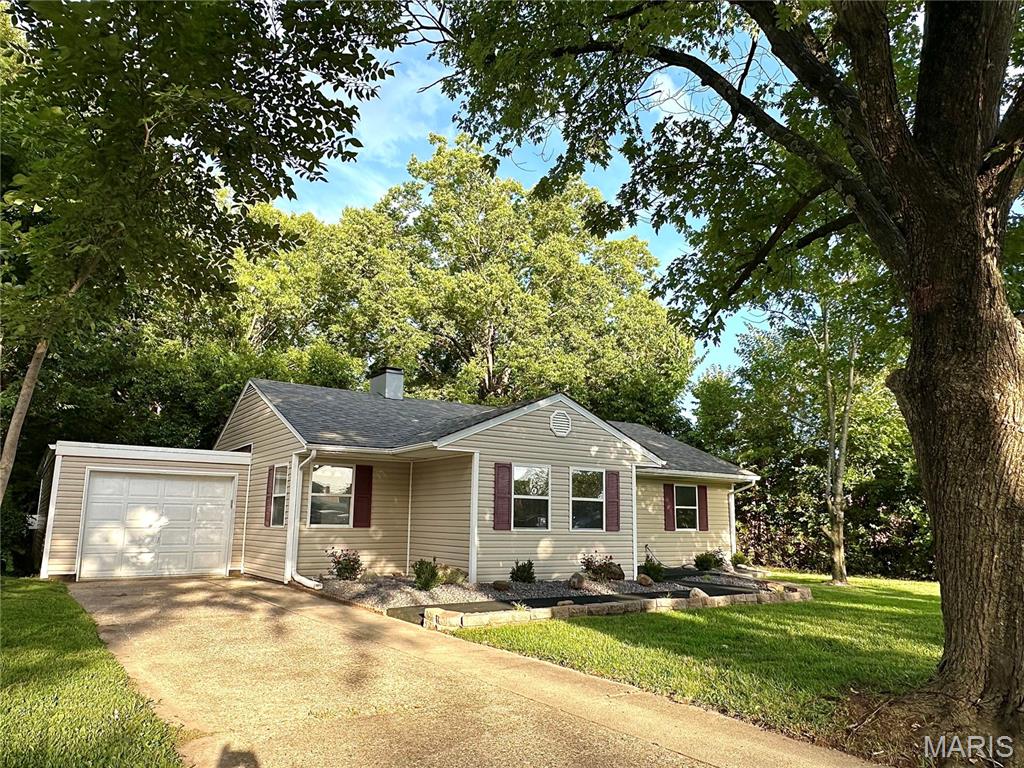 Welcome home to this beautifully updated 4-bedroom home offering more space than you might think and the peace of mind from recent updates. Filled with natural light from abundant windows, this move-in-ready home features new flooring, fresh paint, an updated kitchen, and beautifully renovated bathrooms. The spacious family room with a cozy fireplace is the perfect place to relax or entertain. Step outside to enjoy the fully fenced backyard with mature trees and fresh landscaping. Major updates provide peace of mind, including newer windows and siding, and a new electrical panel installed in 2026. The attached garage adds convenience and extra storage. Ideally located close to shopping, restaurants, and everyday amenities, this home combines comfort, style, and convenience. Schedule your private tour today!