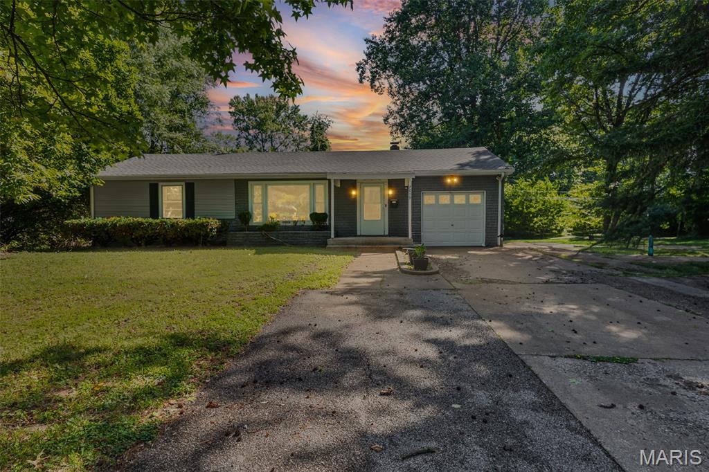 Welcome to 7019 W B Street! This 3BR/2BA ranch offers over 1,500 sq ft and a peaceful setting tucked along a quiet Belleville street. Inside, you'll find a large primary suite, spacious dining area, comfortable living room, and a layout that simply feels like home. Outside, enjoy the oversized recently redone deck overlooking mature shade trees, a fenced backyard, and a glimpse of the pond behind the home. Freshly paint home and kitchen. 

A rare bonus? The separately parceled adjoining lot included with the property, bringing the total space to nearly half an acre between the two parcels. The sellers have loved using the extra lot for birthday parties, entertaining, and extra space to spread out. Detached garage + attached garage. New roof in 2026. Peaceful, spacious, and full of possibilities.
A/V recording on premises