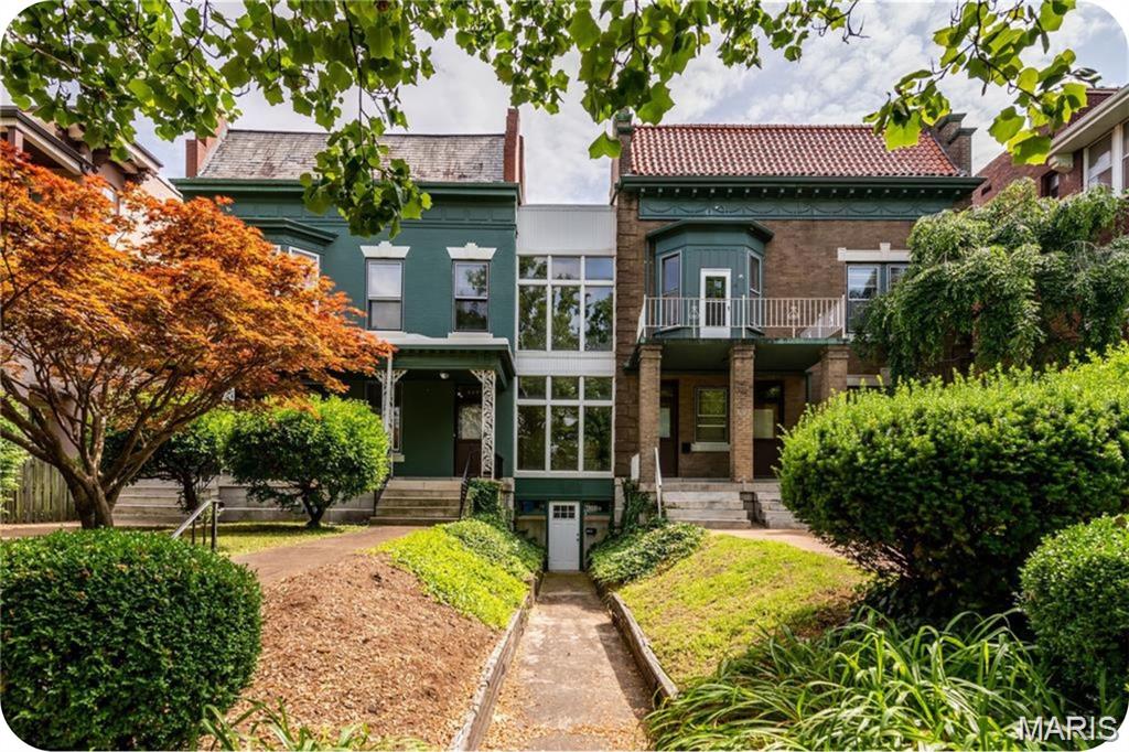 Incredible opportunity to own a rare 4-family residence comprised of 2 adjoined historic buildings nestled into the highly desirable & walkable Central West End. The buildings are connected but divided into 4 expansive & private living spaces, each functioning like a single-family home. Each unit offers 4–5 generously sized bedrooms, 2+ full baths & 2,100–2,500sf of living space. A perfect opportunity for an owner-occupant looking to live in 1 unit while generating income from the other 3 or for a savvy investor looking to acquire an income-producing property in a prime location. Currently, 1 unit is vacant & ready for immediate occupancy, while the other 3 are fully furnished & generating income. 2 are operating as short-term rentals & 1 is a successful Airbnb with consistent bookings. A 5th finished space located in the lower middle section of the property, is currently configured as an office/meeting space. This area includes several rooms/offices, a full kitchen & living room. Laundry hookups in the basement. Recent updates to some of the kitchens/baths. Private parking lot behind the buildings provides ample space for up to 16 vehicles. Near BJC, WashU, the Cortex, Forest Park & more. Whether you're interested in student housing, long-term rentals, Airbnb or owner-occupancy, this versatile property delivers exceptional value & opportunity. Don’t miss your chance to own a piece of history with incredible income potential in one of St. Louis’s most vibrant neighborhoods.