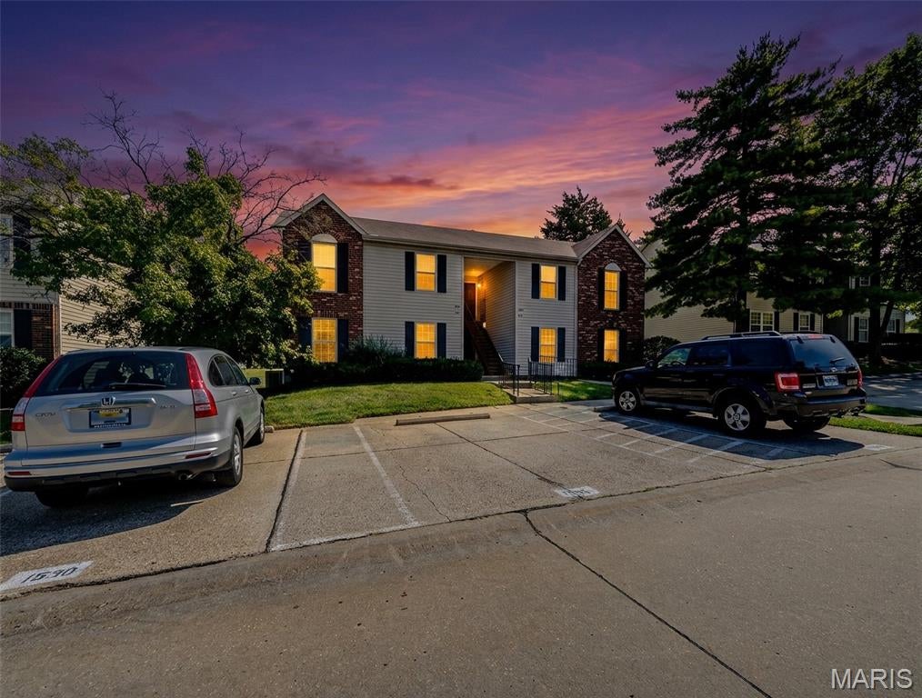 This second level condo is a perfect starter home for anyone who is ready to own their place! It’s move-in ready and in a great location close to all major St Charles highways and shopping centers. It’s been freshly painted throughout and new flooring/carpet 08/2026. The bay window makes the kitchen feel bright and open. There is a deck with storage area. Recently installed stackable washer and dryer will stay as well as all kitchen appliances. Low condo fee of $229.00 per month includes water, sewer, and trash. For an extra $40 a month you can have access to the pool.
