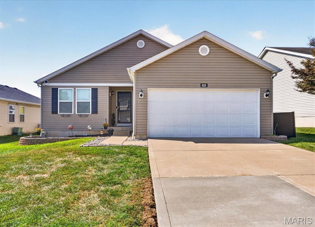 Spacious 5-Bedroom/3 full bath home with exceptional lower-level master suite offering plenty of room for comfortable living, entertaining, and working from home.  The main level features four generously sized bedrooms, two full baths, kitchen with center island, stainless steel appliances to stay, and a main floor laundry room.  The eat in kitchen has been refreshed with freshly updated paint and new electric stove/microwave, giving the space a clean and inviting feel.  The lower level provides an impressive additional master bedroom suite, offering privacy, extended family or private retreat.  The finished lower level also includes a full bathroom, egress window, office, sitting room, family room with vented fireplace, built in bookshelves creating an abundance of additional living space.  So many extras you will find with this home, light fixtures, ceiling fans, walk in closets, & newer carpet.  Backyard is leveled, fully fenced.  Come see all this home has to offer, you will not be disappointed.