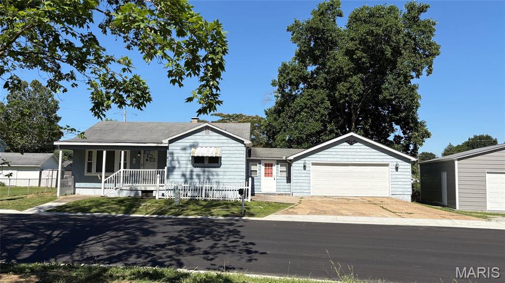 Two bedroom, one bath home in a good neighborhood Sparta, IL Randolph County.   Nice lot size.  Full basement.  Breezeway between two car attached 24X24 garage.  Additional 26X28 garage.  Transferrable Woods basement wall stabilization completed 2025-26.  Sump Pump.  Roof solar panels included.   REO Selling AS-IS.