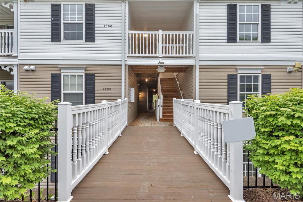 This is the one you've been waiting for! Two bed, two full bath, with vaulted ceilings awaits new owners! No upstairs neighbors in this approx. 1,014 sqft home. You’ll be greeted by an open floor plan and natural light from your private, covered deck with extra storage. Separate kitchen and dining area, plus large living room. Primary bath boasts vaulted ceilings, walk in closet and its own private bath. Spacious second bed and bath. Located in the desirable Springhurst Terrace community which gives you easy access to HWY 40, 70 & 364, plus a playground, pool, and dog park! Assigned carport parking spot and exterior maintenance covered by HOA in addition to water, trash, and sewer.