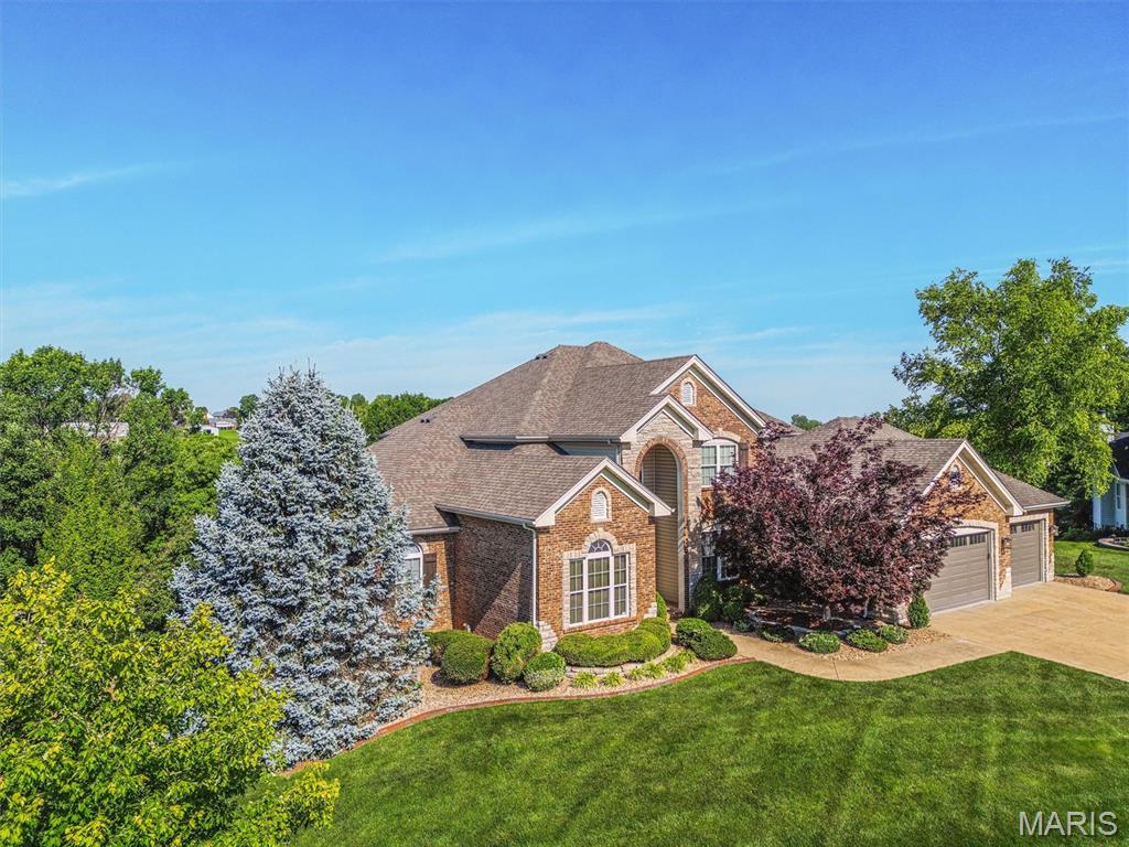 Immaculate 1.5 Story Estate on 1 acre conveniently located near 370/70 and Truman Blvd in St Charles built by Executive Homes.  Over 5,500 sq ft of living space including 2 full kitchens and a Salt Water Pool, 5 car garage and the list goes on.  You will find a floor to ceiling brick fireplace with gas logs and a wall of windows in the Great Room.  There are 2 attached garages - 3 car with epoxy floor a heater and 50 amp RV outlet and 2 car heated and cooled also with a 50 amp circuit - That's right 5 car garage spaces!  Primary bedroom suite is on the main level with an adjoining room perfect for a nursery, study or office.  Upstairs you will find 3 large bedrooms and 2 full baths.  There are 2 staircases to the second floor.  Lower level is equipped with a second full kitchen with a large breakfast bar, stainless appliances as well as a family/rec room and 3 Bonus Rooms  Xtra sleeping/ Exercise/ Pool Changing Room/ Lockable saferoom for priceless collections/ craft room whatever your lifestyle needs, this home has so much to offer.  Enjoy the deck with a view or enjoy the covered patio while the waterfall makes you feel like you are on vacation.  This impeccably maintained home was built by the Builder with great attention to detail for himself.

Seller is a Broker in the State of Missouri.