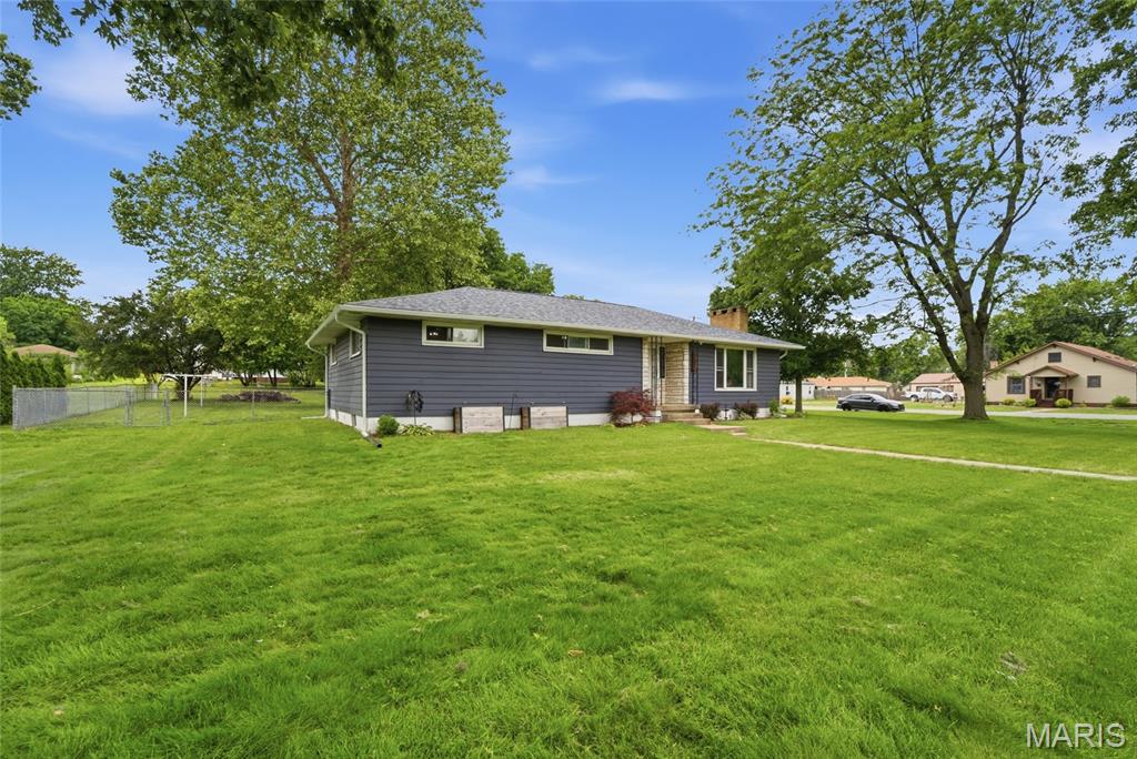 Charming ranch offering the perfect blend of rural living and modern updates! This spacious 2 bedroom, 2 bathroom home features over 1,494 sq. ft. of comfortable living space situated on a generous 1/2 acre corner lot. Recent improvements provide peace of mind, including updates completed in 2021, flooring, drywall, painting, plumbing, electrical just to list a few.  Along with a brand new roof, gutters, and water heater installed in 2026. Enjoy relaxing mornings in the adorable breezeway connecting the home to the attached 1 car garage, the perfect spot for coffee and quiet reading time. The fenced yard offers plenty of room for pets, gardening, or outdoor entertaining. Inside, you'll find a functional layout with spacious rooms and a full basement complete with abundant storage space and a dedicated workbench/storage area for hobbies or projects. The main level is complete with a full laundry room and the primary bedrom has a adjoining primary bathroom. Experience the charm of rural living while still being conveniently located for an easy commute to surrounding communities, shopping, and local amenities. This well-maintained property is ready for its next owner to call it home! Contact your agent today to schedule your private showing..