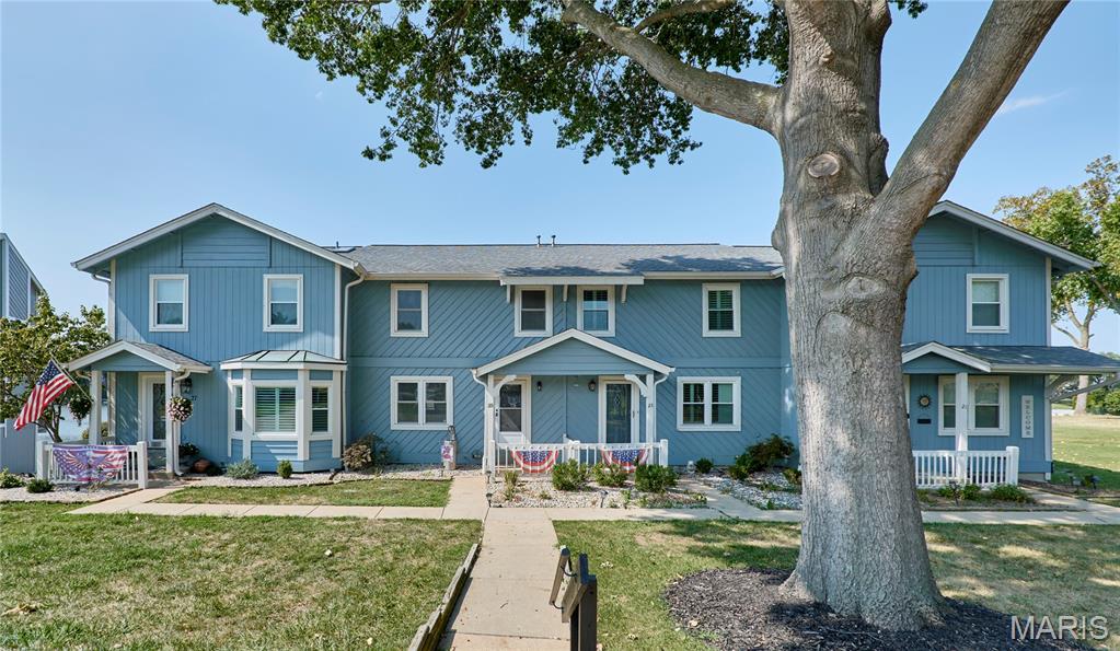 UNBELIEVABLE OPPORTUNITY! PANORAMIC VIEWS & DIRECT ACCESS TO WATERFRONT & MARINA! Boating? Skiing? Fishing? Swimming? This is a unique opportunity to have it all! Over 2300 sq ft of updated living space with 3+ bedrooms, 4 bathrooms on a walk out lot to the water. Lets first talk outdoor living - Main level boasts a large deck off the family room with Rain Tight under system, Primary bedroom features a private Juliet balcony for quiet morning coffee, killer views and seasonal Eagle watching. Lower level walk out has expanded patio and that flat common ground to the water. This home was made to enjoy outdoor living & dreamy views. The entry is where your first water view begins and has coat closet. The living room is on the left and the dining room on the right. Down the hall, past powder room with solid surface sink & the double switchback staircase to the open concept kitchen featuring stainless appliances, granite countertops & island with gas cooktop afford so much workspace & storage & seating. Adjacent is the large family room leading to the main deck for outdoor dining and daily enjoyment of the panoramic water view. Up to the large primary, on suite bedroom with gorgeous water views, automatic blinds, a reading area and a wall of closets. 2 more bedrooms & hall bath. Lower level features a huge rec room with recently added custom cabinetry, sink and granite with more spectacular views and a walk out. The bonus room has custom gym graded flooring to use as you please. Lower has 1 more full bath & storage area. Zoned heating/cooling. Lakes, marinas, golf, tennis pools, clubhouse, too many community features to list! Life does not get better than this for this kind of pricing so don't drag your feet!