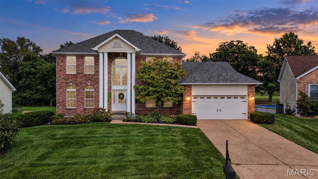 Welcome to 4 Big Country Circle, a lovingly cared-for 1.5-story brick home tucked away on a quiet cul-de-sac in the sought-after Villages of Dardenne! This home offers a truly special setting, backing to wooded common ground and Dardenne Creek while overlooking the Links of Dardenne Golf Course. Mature arborvitaes and landscaping provide even more privacy, creating a peaceful backyard retreat where you can relax on the patio, enjoy the spacious level yard, and watch the abundant wildlife just beyond your own backyard.

Inside, natural light fills the spacious living room through large windows that showcase the beautiful views. A gas fireplace adds warmth and charm, while the separate dining room provides the perfect space for entertaining. The kitchen and breakfast room flow together beautifully and feature several 2025 updates, including quartz countertops, a ceramic tile backsplash, granite sink, and new garbage disposal.

The main-floor primary suite offers convenience and privacy with a large en suite bathroom, while the main level also includes a laundry room and attached 2-car garage. Upstairs, you'll find three additional bedrooms, a full bathroom, and a versatile loft area perfect for a home office, playroom, reading nook, or additional living space.

Need even more room? The large unfinished basement offers plenty of space to create exactly what you need, whether that's a rec room, home gym, additional living space, workshop, or storage.

Additional highlights include a new roof in 2019 and years of thoughtful care from the current owner.

Living in the Villages of Dardenne means enjoying an incredible neighborhood lifestyle with access to three subdivision pools, a clubhouse, tennis courts, and fishing lakes, plus the Links of Dardenne Golf Course right nearby. All of this within the Fort Zumwalt School District.

Privacy, beautiful views, a spacious floor plan, community amenities, and a backyard setting that's hard to replicate. 4 Big Country Circle is ready to welcome its next owner!