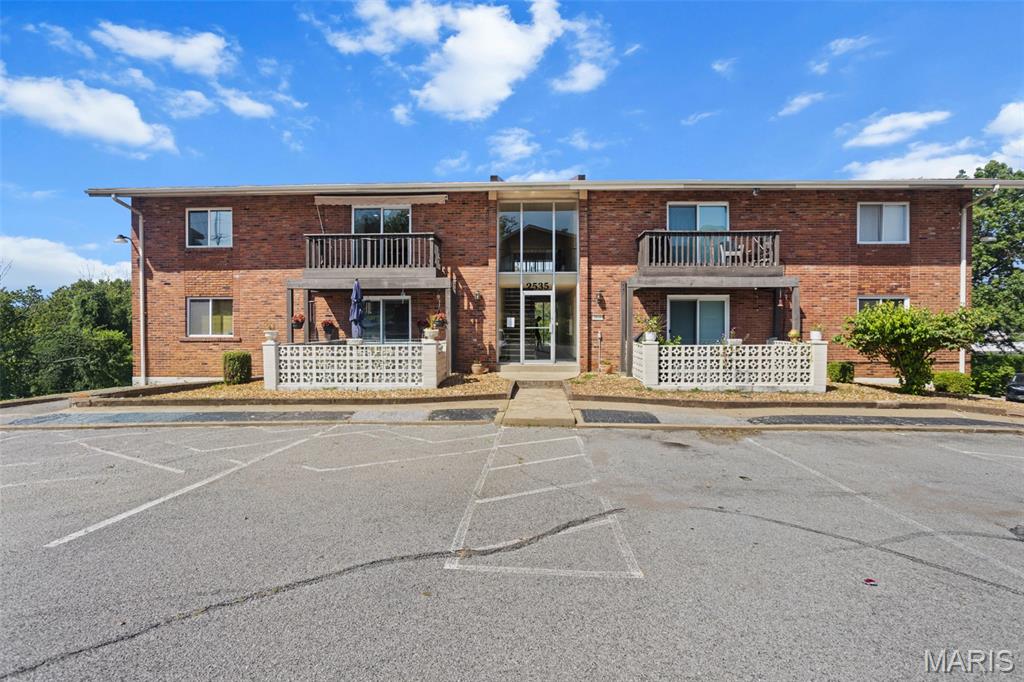 Stunningly updated condo in the heart of South County is better than turn-key ready, and is available for immediate occupancy!   It'll be impossible to find a nicer kitchen in this price range, which showcases white shaker cabinets, granite countertops, granite backsplash, stainless steel appliances, built-in micro, dishwasher & pass through window.  Extra kitchen storage is not an issue here as the cabinets & countertops extend into the breakfast room and includes wine/beverage fridge & island/breakfast bar.  Elegant luxury vinyl plank flooring extends all throughout the condo and greets you at the home's entrance where the family room comes alive with a fabulous stone accent wall, recessed lighting, natural light shining through the sliding glass door accessing the exterior balcony, and a convenient coat armoire & drop zone.  A fully updated bathroom, a large primary bedroom, a comfortably sized secondary bedroom, and laundry & private storage closet in the complex's basement completes this beauty! And with it being just a few minutes to HWY's 55 & 270, or just 15min to downtown, the convenient location is second to none!