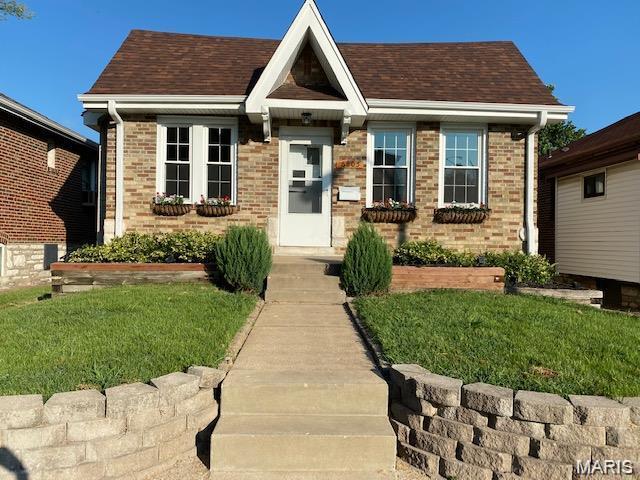 Welcome to this very nice 2 bedroom bungalow in south city.  Within walking to Holly Hills and Carondelet park. You will enjoy the hardwood floors throughout, a large living room and separate dining room. The kitchen walks straight out to the deck and overlooks a large, level backyard.  There is off street parking on your private driveway.  The alley in the rear also gives access to large gates in the rear of the yard.  Furnace and ac new in 2024, water heater 2023.  Roof replaced in 2015. The large ,clean baement is dry and has plenty of space for storage.