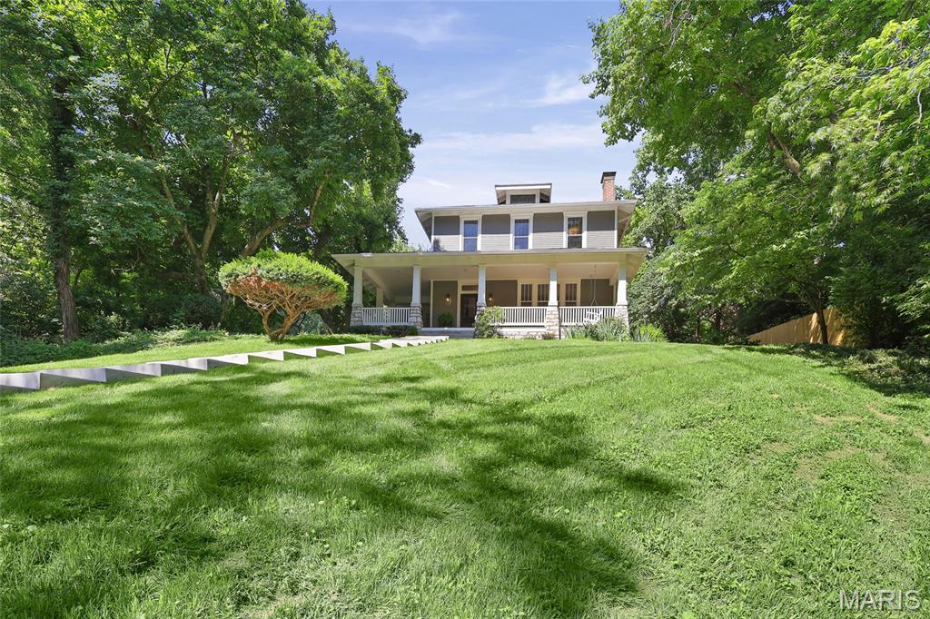 Storybook charm meets modern luxury! Welcome to your private oasis, located in the highly revered and historic Signal Hill neighborhood. Tucked away in a serene, storybook-like setting surrounded by lush vegetation, sculpted foliage and an artisan brick terrace, this magnificent residence offers total peace and privacy. The property has been comprehensively renovated to the highest standards, seamlessly blending timeless architectural integrity with the absolute finest in modern, high-end luxury. The perfect blend of character & modern updates! Step through the front door into a grand foyer that immediately showcases the home’s stunning woodwork. While the historic craftsmanship remains intact, the home functions like new construction. Enjoy complete peace of mind with fully updated mechanical systems, including brand-new plumbing, all-new electrical wiring, dual high-efficiency HVAC system, and a new water heater. Throughout the home, high-end light fixtures and updated premium finishes elevate every space. The heart of the home is a spectacular custom kitchen, fully equipped with high-end finishes, premium countertops, and top-tier appliances. When it is time to unwind, step outside onto the expansive, beautiful wrap-around porch—the perfect spot to drink your morning coffee or entertain guests while taking in the lush, private views. The exterior assets are just as impressive as the interior. Mechanics, hobbyists, and creators will fall in love with the massive detached garage, which features an expansive area with room for a workshop or studio. The outdoor patio, with a functioning water feature, is the perfect location to host your evenings and soak in  the stunning views of this fairy tail setting. An additional matching storage shed on the property ensures your primary garage and living spaces remain entirely clutter-free.  Schedule your private tour today! Agent interest.

Updates include:  All new custom cabinetry, all new interior and exterior paint, refinished wood flooring throughout, updated windows throughout, new dual HVAC, new water heater, new electric throughout, new plumbing throughout, newly remodeled bathrooms with beautiful ceramic tile and more!!