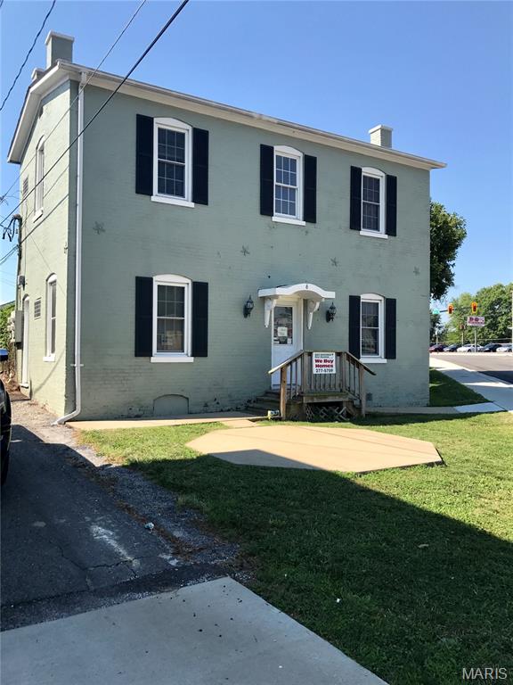 Refurbished office space in a highly traveled area of downtown Belleville, just seconds from the courthouse and public square. Perfect for small business, small retail (formerly housed a barber shop a real estate office and a law office), or a home office needed a mailing address. 2 separate office on main level, 2 on the upper level (each 11 x 15) and a common bathroom. Recently carpeted and painted, newer roof, maintenance-free soffit/guttering. One office furnished (see pictures). New curbing, street pavement, and street lighting recently finished by the City of Belleville.