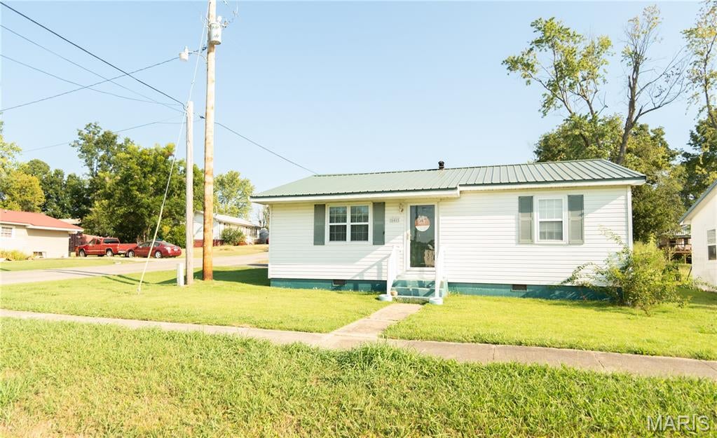 Welcome to 601 E Richardson Ave in Puxico, Missouri! This charming 2-bedroom, 1-bath home is a wonderful opportunity for a first-time homebuyer, someone looking to downsize, or an investor searching for a property with added potential. Situated on a quiet street, the home offers a comfortable and inviting setting with the convenience of small-town living.
A unique bonus to this property is the separate 1-bedroom, 1-bath apartment located on the property, complete with its own private driveway. The apartment could provide additional living space for family or guests, a potential rental opportunity, or an ideal setup for an investment property. With some imagination, the space could also be converted back into a workshop or additional workspace to suit your needs.

Whether you're looking for an affordable place to call home, a property with room for family, or an investment with multiple possibilities, this property offers flexibility and opportunity. Don't miss the chance to make this charming Puxico property your own!