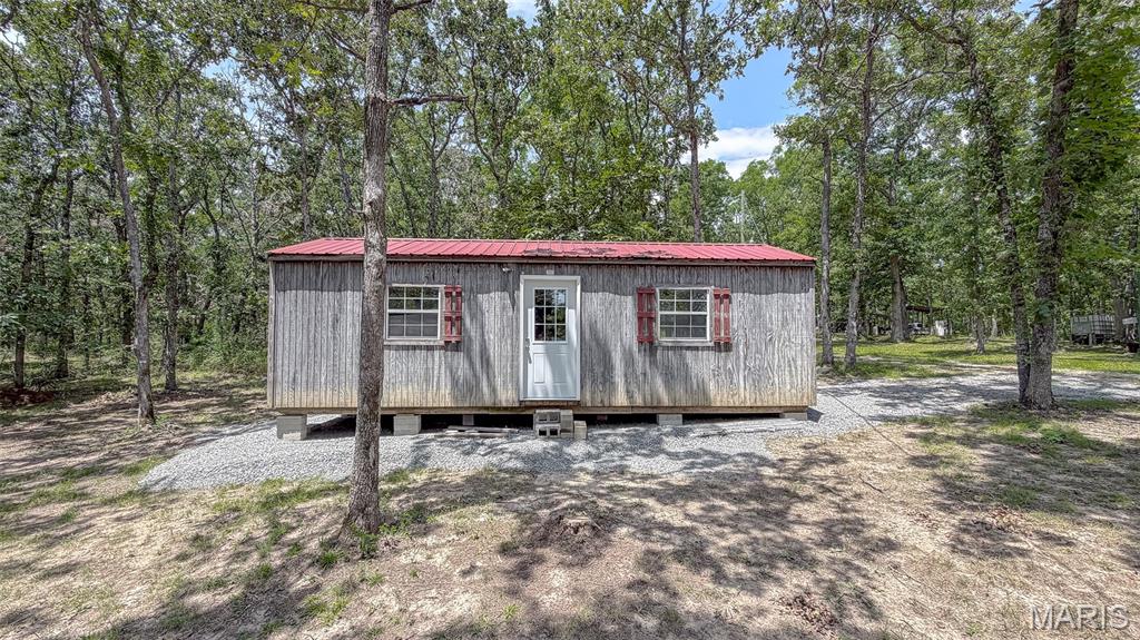 Escape to Lake Harmony with this 0.22 acre lot, recently surveyed and ready for your future getaway! Whether you're dreaming of building a cozy cabin or setting up a camper, this property offers easy road access with electric coming soon. A 12' x 30' shed is already in place, providing excellent storage or the opportunity to customize it to fit your needs. Enjoy everything Lake Harmony has to offer, including fishing, swimming, kayaking, boating, and camping. The community features two boat ramps, along with public restrooms and showers, making it easy to enjoy weekends at the lake. Conveniently located just 5 minutes north of Fredericktown and approximately 100 miles south of St. Louis, this property offers the perfect balance of peaceful lake living and easy accessibility. Whether you're looking for a weekend retreat or a place to create lasting memories, this is an opportunity you won't want to miss!