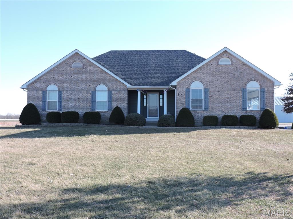 Welcome home to this beautiful Ranch with huge shed on 5 acres in northern St Charles County!!  Bring the horses or RV, boat, classic cars!  No subdivision or HOA!!    This all electric home has been very well take care of with many recent updates.   These include newer roof, siding, triple pane windows, paint, granite countertops, ceramic tile and other things.   Walk past the extensive landscaping and full brick front to enter the front of the home through the foyer with large coat closet.  Spacious living room has vaulted ceiling along with a brick fireplace (woodburning or propane currently has gas logs).  Updated kitchen includes fridge, range, microwave and dishwasher (all stay with home).  Separate laundry room between garage and kitchen.   Dining room has full view of the huge back yard and a glass door that opens onto the patio.   Large master suite with roomy walk in closet.   Master bath has new granite, ceramic tile and separate shower and garden tub.   Bedroom #2 and #3 are sizable with large closets and currently used for a home office and guest room.  Garage has new garage door and is partially drywalled and painted.  Huge covered patio to enjoy the sunsets, morning coffee or back yard BBQs.   Property includes a 40 X 60 shed with full concrete floor, electric,  and 10 ft rollup doors.   The shed has plenty of room in the panel box for additional welder, RV hookup, machinery, you name it.    The shed has a high ceiling and affords a huge amount of covered space for many options.   Turn it into your horse barn, restore those classic cars, or maybe just store your boat and RV?     Property comes with it's own well, water softener, etc.    No HOA.   Horses welcome.    Schedule your showing today!