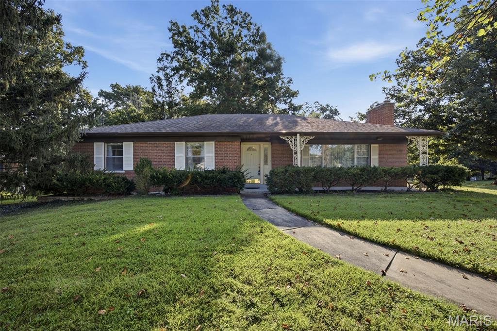 Rare opportunity with an unbeatable location in the heart of Des Peres in the desirable St. Clement Acres subdivision!  Spacious brick ranch on a large 0.4 acre, level lot with mature trees.  Hardwood floors throughout the foyer, living room, dining room, family room, and 3 main floor bedrooms.  Living room with crown molding and beautiful fireplace, flowing into adjacent dining room with crown molding, and chair rail. Massive family room with second fireplace is perfect for entertaining.  Sunporch has a bar, and a covered patio area off sunporch that is great for grilling out of the weather. Concealed rear entry garage.  Kitchen, master bath, and hall bath have ceramic tile and are ready for your updates. Unfinished lower level with a roughed-in bathroom with the opportunity to add substantial additional recreational or living space. Master suite has walk-in closet. Kirkwood Schools, and low Des Peres taxes coupled with fantastic municipal services. Close to hospitals, shopping, and dining. Subdivision has walking trail to Des Peres Park with lake, walking trails, pickleball, shuffleboard, tennis, and playgrounds!