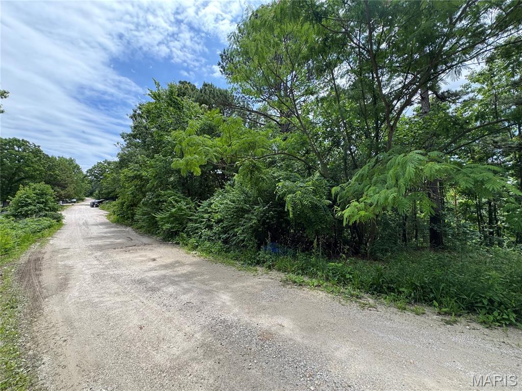 Opportunity awaits with this versatile 0.20 +/- acre residential lot featuring public water, public sewer, and electric nearby for connection. Mobile homes are permitted, making this an excellent option for mobile home placement or future homesite. Buyers & buyers agents are encouraged to perform their own due diligence regarding the condition and suitability of all improvements, utilities, zoning, lot boundaries & subdivision restrictions if any. Conveniently located in between St. Robert & Dixon Missouri and ready for your vision to take shape.