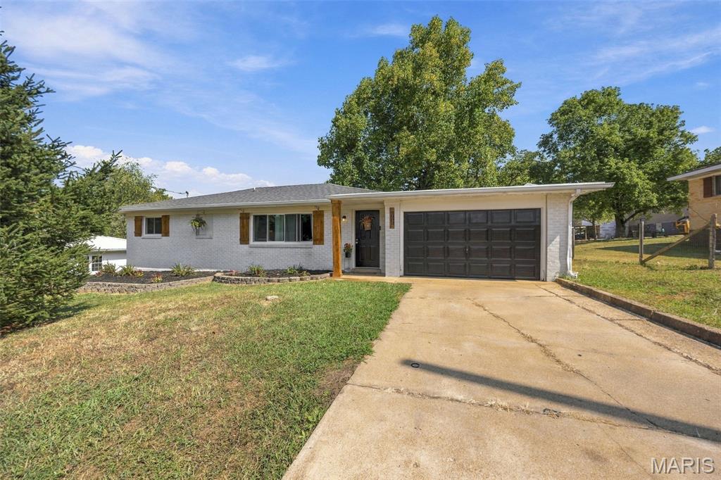 Welcome home to this beautiful, move-in-ready 3-bedroom, 2-bathroom property in Potosi! Offering 2,137 square feet of thoughtfully designed living space, this home features two distinct living areas—a bright front living room and an expansive, versatile family room that easily functions as a fourth bedroom, home office, or game room. Step inside to discover fresh, stylish flooring throughout and a beautifully updated kitchen with modern finishes, perfect for everyday meals and entertaining. Outside, crisp new landscaping creates excellent curb appeal, while the one-car oversized attached garage provides additional storage and workspace. The spacious backyard offers endless possibilities for weekend barbecues, play equipment, or a quiet outdoor retreat. Nestled in a peaceful, friendly neighborhood, this turn-key home blends quiet living with unmatched convenience, putting local schools, shopping, and dining just minutes away. Schedule your showing today!
