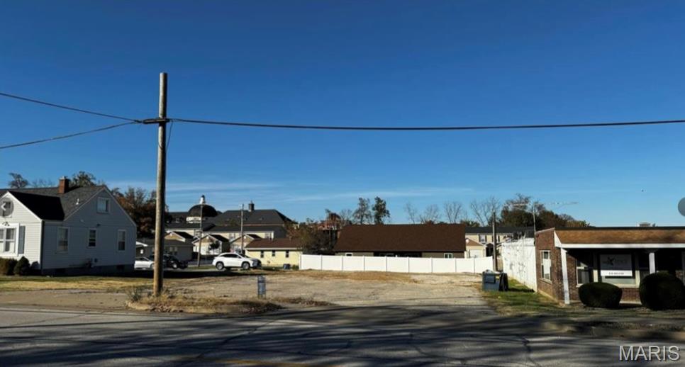 This exceptional lot offers a unique chance to invest in Downtown O'Fallon's growth. Its C-1 zoning, combined with its location in the Downtown Overlay District, provides flexibility for various uses. The lot is level, with utilities ready, making it an attractive option for developers. Potential uses include mixed-use, multi-family, office, retail, and cafe developments, offering a wide range of possibilities. Verify zoning and use with the City of O'Fallon to explore the full potential of this lot.