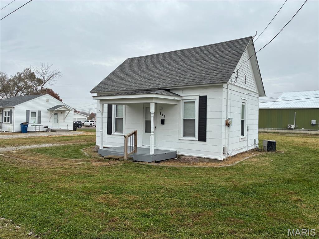 Welcome to this cute and comfortable 2-bedroom, 1 bath home! Ideal for the first time buyer or a downsizing opportunity. Living room opens to the eat-in kitchen featuring white cabinets and tile backsplash and all appliances, including washer and dryer. (microwave 2025) Spacious up to date bath with double bowl vanity. New carpet in living room and both bedrooms (2025) Nicely sized rear yard ideal for gardening or pets. Low maintenance, affordable living in a convenient location. Termite treatment 2/26. Furnace serviced 2/26.  Inspections are for informative purposes only.