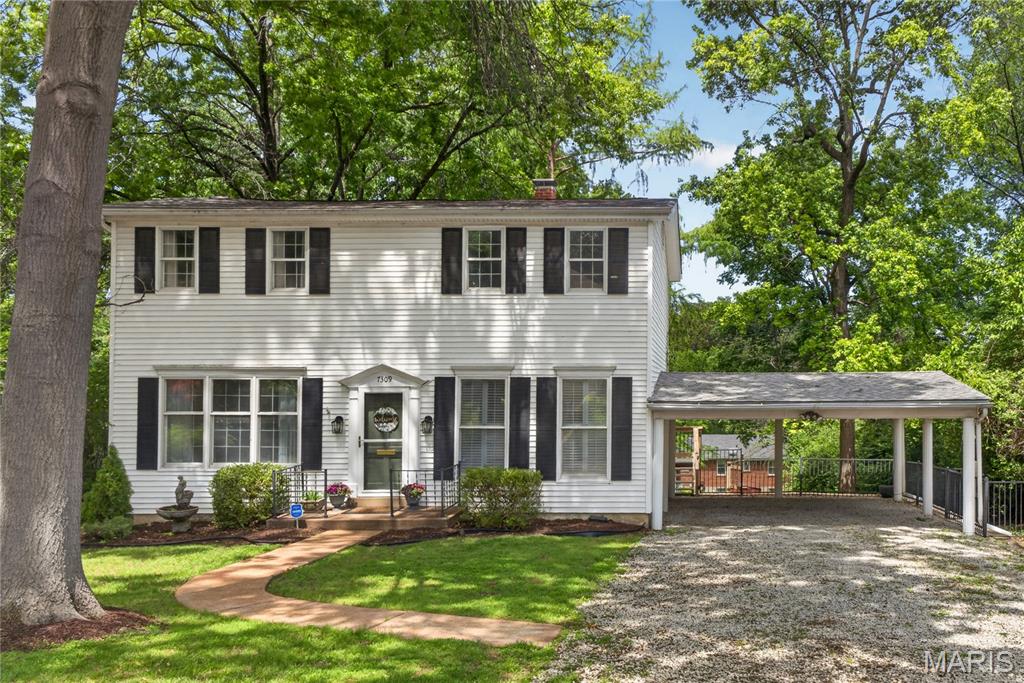 Beautifully updated 4 bedroom/2 full bath home in highly sought after Webster school district. Located on a quiet Shrewsbury street close to parks and central to everything! Picture-perfect and charming, home is nestled on huge lot with plentiful greenspace surrounded by lush trees and lovely landscaping. This amazing home boasts gorgeous spaces including beautiful kitchen with white quartz countertops, custom cabinetry, and stainless appliances; stylish living and dining areas including stunning built-ins and focal historic fireplace mantel; all bedrooms are large, including spacious primary suite boasting incredible custom closet and designer bathroom accessible en-suite. Charming sunroom adjoins large deck perfect for entertaining with views of sweeping backyard. Large recreation room in lower level is perfect for relaxation or game nights and includes built-in dry bar with marble top. Additional amenities include newer roof and electrical panel as well as newer zoned HVAC. Sewer lateral was replaced by MSD in backyard within the last 3 years as part of their community program. The two-car attached carport provides additional convenience and the large fenced-in yard is perfect for future pets and kids. Truly a remarkable home just waiting for the next lucky owners!