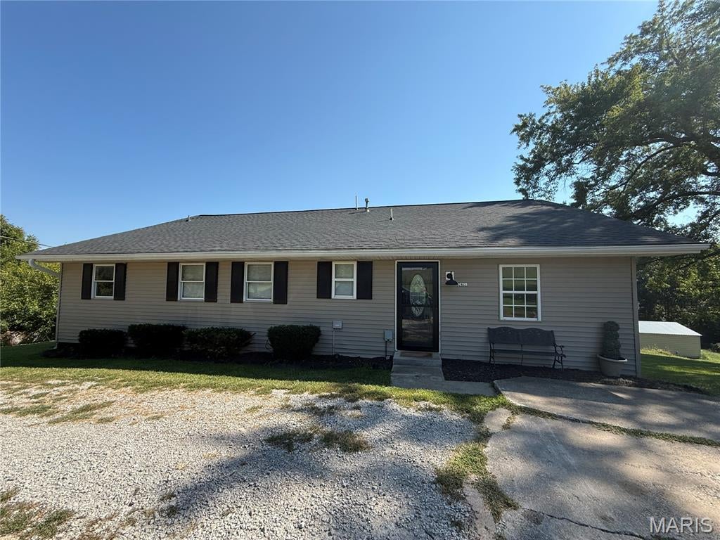 You will love this well cared for home on the outskirts of town!  Three to Four bedrooms with two full baths this home offers an abundance of space with a nice open floor plan.  New roof in 2023 and the Central Air unit was updated in the spring of 2026.  The deck has been rebuilt within the last 5 years and overlooks the private back yard.  2 Car detached garage is a plus!
