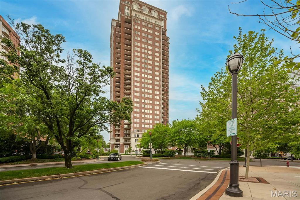Experience elevated living at the most coveted address in town- The Plaza in Clayton. This spacious 13th floor two bedroom, two and a half bath residence features four private balconies with north, west, and south views.  The gracious  foyer opens to the living room, lovely dining room and large eat in kitchen with island featuring custom Markway cabinetry , granite countertops, 48" side by side SubZero,  Miele dishwasher, Wolf oven,  warming drawer,  Wolf 5 burner gas cooktop with hood,  bar sink, beverage refrigerator and breakfast room with great views.  Across from the kitchen, the cozy family room has a wall of built-in bookcases and a nice laundry room with lots of good storage.   Down the hall find the primary suite with a sitting room, two balconies, spacious his/her closets, lovely bath with large walk in shower, soaking tub and two vanities . 
The guest bedroom has an ensuite bath and custom closet.  Across the hall is a fabulous office with built in desk, cabinets, large closet and incredible views.  Large coat closet and charming powder room off the entry hall.  Also included is a storage unit and two assigned parking spaces.  This is a full-service building with 24-hour concierge, beautiful formal areas, valet,  pool,  fitness center and dog park, in the heart of Clayton surrounded by shops and restaurants.