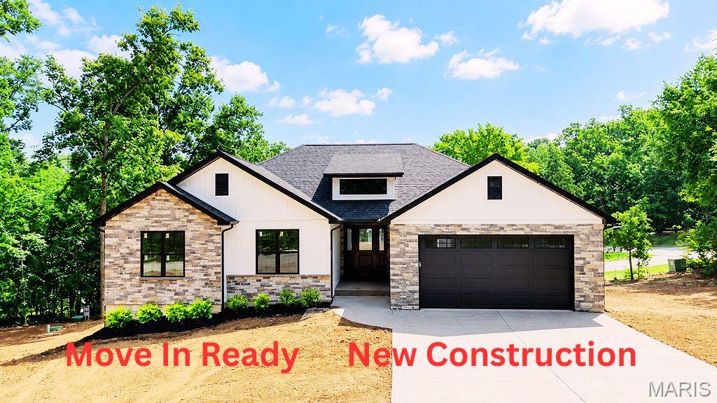Welcome to this New Construction home in Summer Set Lake.  Completed and now ready for it's family.   This home features an open floor plan , Vaulted Ceiling, main floor laundry, custom cabinets, stainless stell appliances, luxury vinyl flooring, granite counter top, composite deck, stamped concrete, attached 22x22 garage, corner lot, walk in shower, double vanity and large walk in closet.  Modern black gutters and windows.  Enjoy comfort and luxury perfectly nestled on a corner lot.  This community offers a location great for outdoor enjoyment with 3 lakes and beach access along with a great picnic area, great for walking and biking and a community campground.  Many family memories ready to be made here.  And a brand new home to make your own.