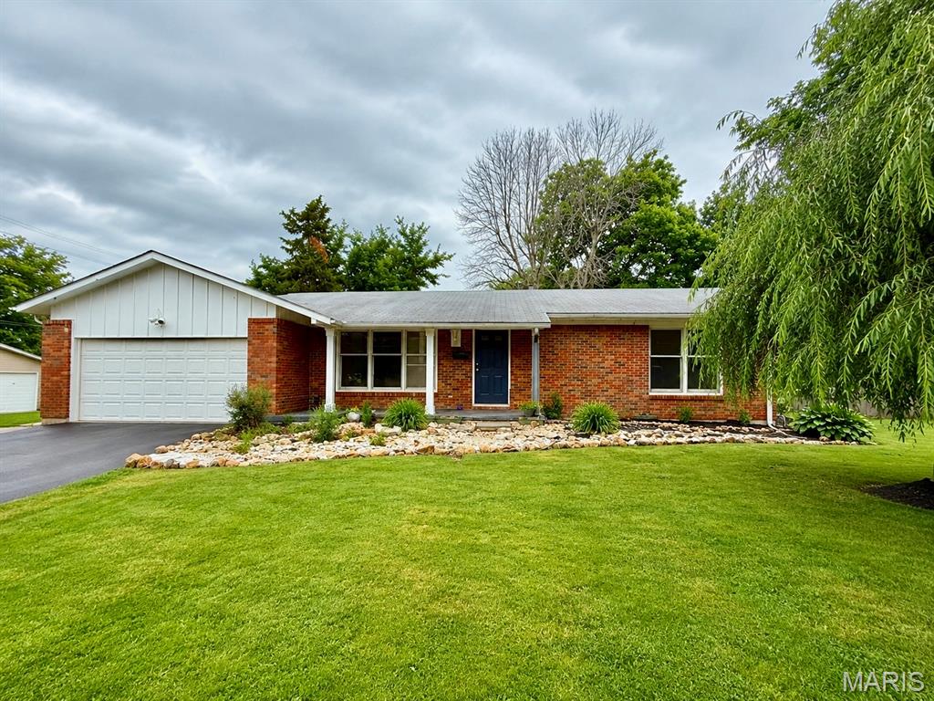 COMING SOON! Showings start June 19th. 

Full brick home situated on a spacious corner lot with a huge, fenced backyard featuring mature shade trees, fruit trees, and plenty of privacy. Enjoy the screened-in patio just off the dining room, perfect for relaxing or entertaining. Inside, you’ll find abundant natural light, large open living space. This 3-bedroom, 1.5-bath home features new kitchen cabinets, countertops, and flooring. The oversized living room and dining area create a welcoming atmosphere, complete with a cozy wood-burning stove. Home is heated by a gas forced-air furnace. Central air is currently not operational. Don’t miss this opportunity to make this charming property your own!