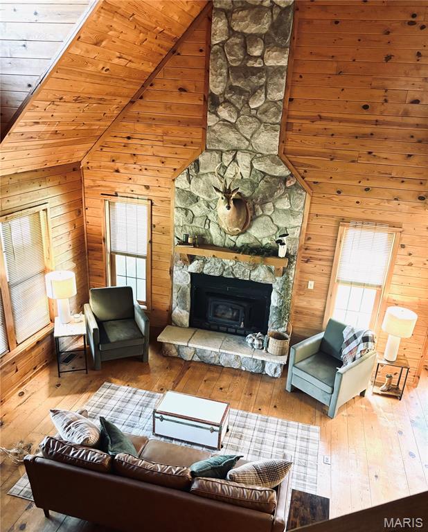 A Private Country Retreat with Endless Possibilities!
Welcome to this beautiful 3-bedroom, 3-bath log cabin nestled on 9.5 private acres, where rustic charm, privacy, and self-sufficient living come together. Whether you’re looking for a peaceful full-time residence, a weekend retreat, or an opportunity to create an income-producing property, this unique property offers incredible versatility.
The cabin features real hardwood floors, warm wood finishes, and a beautiful stone fireplace that creates the perfect gathering space. With bedrooms located on both the main and upper levels, there is plenty of room for family and guests.
Enjoy the beauty of the outdoors from the large front porch or relax on the screened-in back porch, perfect for morning coffee, entertaining, or enjoying peaceful evenings surrounded by nature.
This property has already been used as a wedding venue, showcasing its potential for gatherings, celebrations, and special events. With its picturesque setting, private acreage, charming cabin, and multiple outdoor spaces, the property could also offer potential for an Airbnb or other short-term rental opportunity.
Energy efficiency and self-sufficiency are additional highlights. The solar panels are fully paid off, and a wood-burning furnace provides an additional heating source, helping keep energy costs down while providing an alternative source of heat.
A large outbuilding adds even more versatility, offering ample space for storage, equipment, a workshop, hobbies, or business-related needs.
Whether you envision a private homestead, a family getaway, a wedding and event property, or a potential short-term rental, this one-of-a-kind country retreat offers a rare combination of privacy, character, functionality, and opportunity.