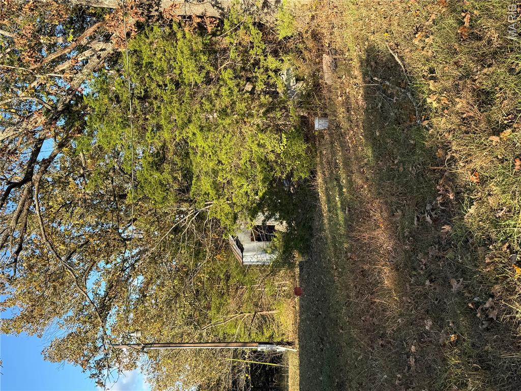 Seventy acres (m/l) ready for your next adventure! This property is already established with electricity, a well, and a lagoon in place. Two mobil homes remain on-site but hold no value, and the land has been vacant for several years. Conveniently located just 1.5 miles down a gravel road and less than 10 minutes from town, this is the perfect setup for a hunting retreat, weekend getaway, or future building site.