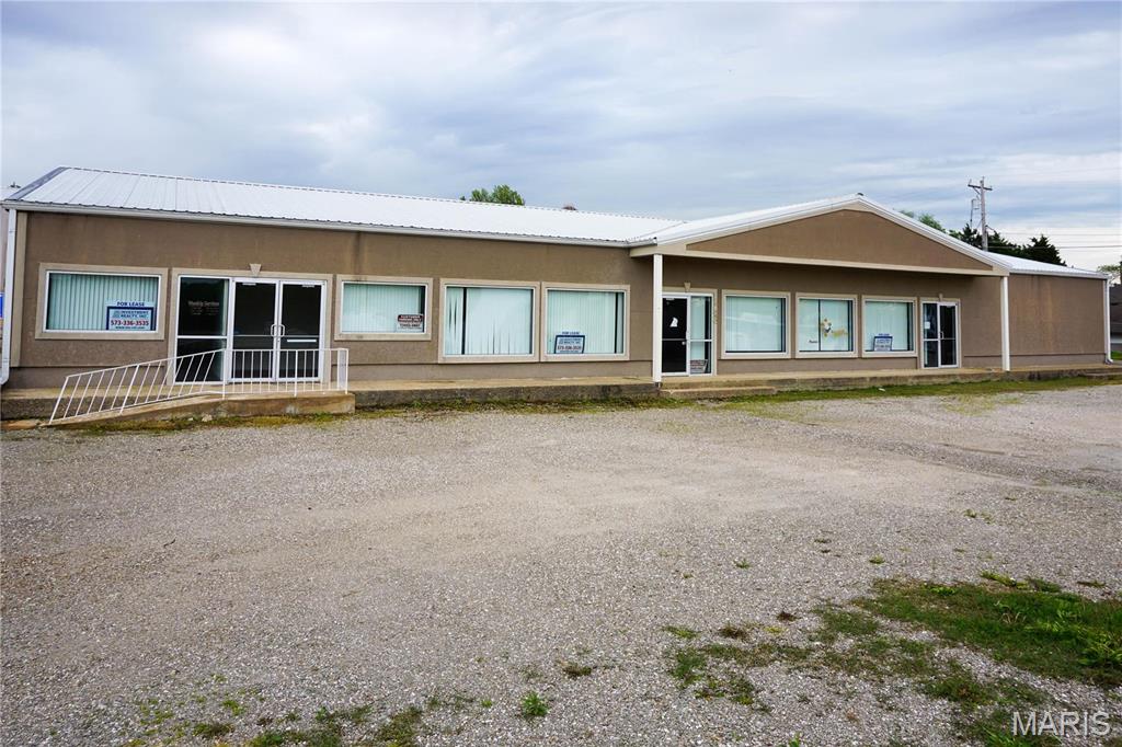 Fully Leased Commercial Property with Office Space & Warehouse

This income-producing property spans approximately 0.84 acres and includes a 5,700 m/l sq ft building with 5 private offices, a receptionist area, large meeting hall, kitchen with stove, break room, maintenance room, private restrooms, and additional restrooms with stalls. The layout offers flexibility for a variety of business or organizational uses.

The building is equipped with 3 high-efficiency furnaces, a fire alarm, and a security system.

Also included is a 7,100 m/l sq ft warehouse with 6 overhead doors, divided into 3 separate spaces—each with the potential to be leased individually for added income.

Fully leased and well-maintained, this property offers immediate returns and long-term investment potential.