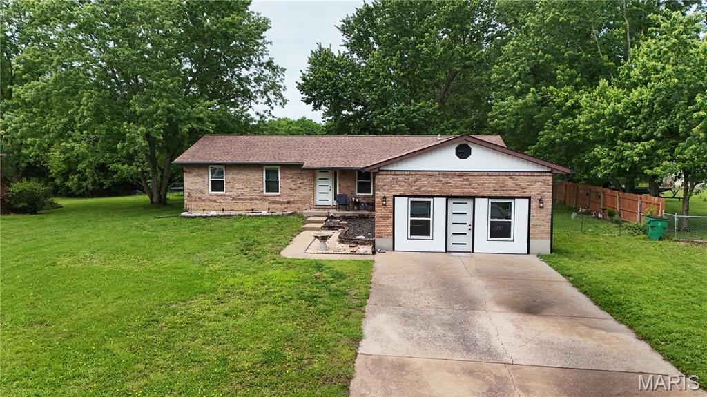 Don't miss your chance to check out this beautifully updated 3 Bedroom 2 Bath Ranch home! Featuring New vertical siding, New windows, New flooring throughout the main areas, Updated Kitchen, New light fixtures, & fresh paint! Main floor laundry and a full unfinished basement are great additional features! Entertain guests in the large great room or on the patio. You'll have plenty of storage for all your hobbies in the 22x30 detached garage. And enjoy your summers as the property backs to the community pool!