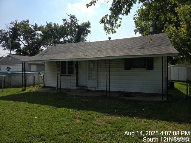 Calling all investors!!! Property has a tenant in it at $900/mo!! Add this house to your portfolio today! Located in a quiet Wood River neighborhood, just minutes from shopping, restaurants, highways, etc!! This same seller has a total of 4 properties listed, so let's work out a deal! ***Seller financing available!!!***