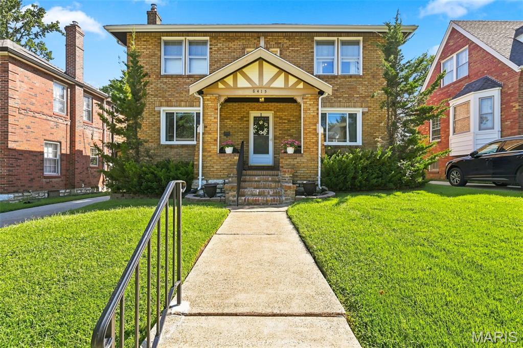 ?Own a true piece of Hollywood history! Once owned by Mickey Carroll, one of the iconic Munchkins from The Wizard of Oz, this 1931 brick Craftsman home boasts a storied past—having welcomed legendary guests like Judy Garland and President Harry S. Truman. Offering 1,836 sq ft across 11 rooms, the main level features classic wood floors, an arched doorway, open beam details, a sunroom, a dedicated family room, and a light-filled living room anchored by a fireplace. All 4 bedrooms are conveniently located upstairs. Additional highlights include a full walk-out basement, a tuck-under 2-car garage, and a level 0.22-acre lot. Located in desirable Bel-Nor within walking distance to UMSL and minutes from I-70 & I-170. Perfect for buyers or investors seeking classic architectural detail, prime location, and unmatched historical provenance!