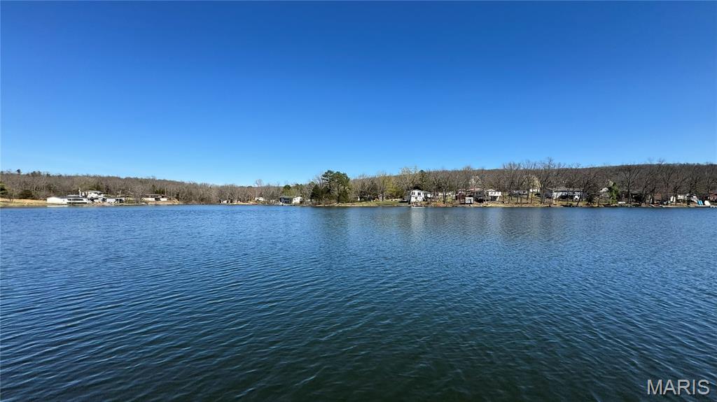 NOW WITH NEW PRICE!

Experience the opportunity to own approximately 1.42 acres across 8 combined parcels within the desirable Holiday Shores Private Lake Community. This unique multi-lot offering provides flexibility for a custom homesite, weekend retreat, or future investment opportunity.

The property features double road frontage with access from two separate roads, allowing for versatile building placement and accessibility.

Enjoy the benefits of a recently revitalized community lake, enhancing the natural setting for fishing, wildlife, and outdoor recreation.

Property is subject to subdivision covenants, restrictions, and building guidelines. Utilities are not currently installed. Buyer to verify requirements for well, septic, and electric connection.

Located within a private lake community with restricted access. All showings require a scheduled and registered appointment.

Sale includes 8 Parcel IDs:
30-6.0-014-003-010-006.01000
30-6.0-014-003-010-006.00000
30-6.0-014-003-010-007.00000
30-6.0-014-003-010-008.00000
30-6.0-014-003-010-009.00000
30-6.0-014-003-010-014.00000
30-6.0-014-003-010-015.00000
30-6.0-014-003-010-016.00000

A rare opportunity to secure multiple parcels within an established private lake community with room to create your own getaway vision.
