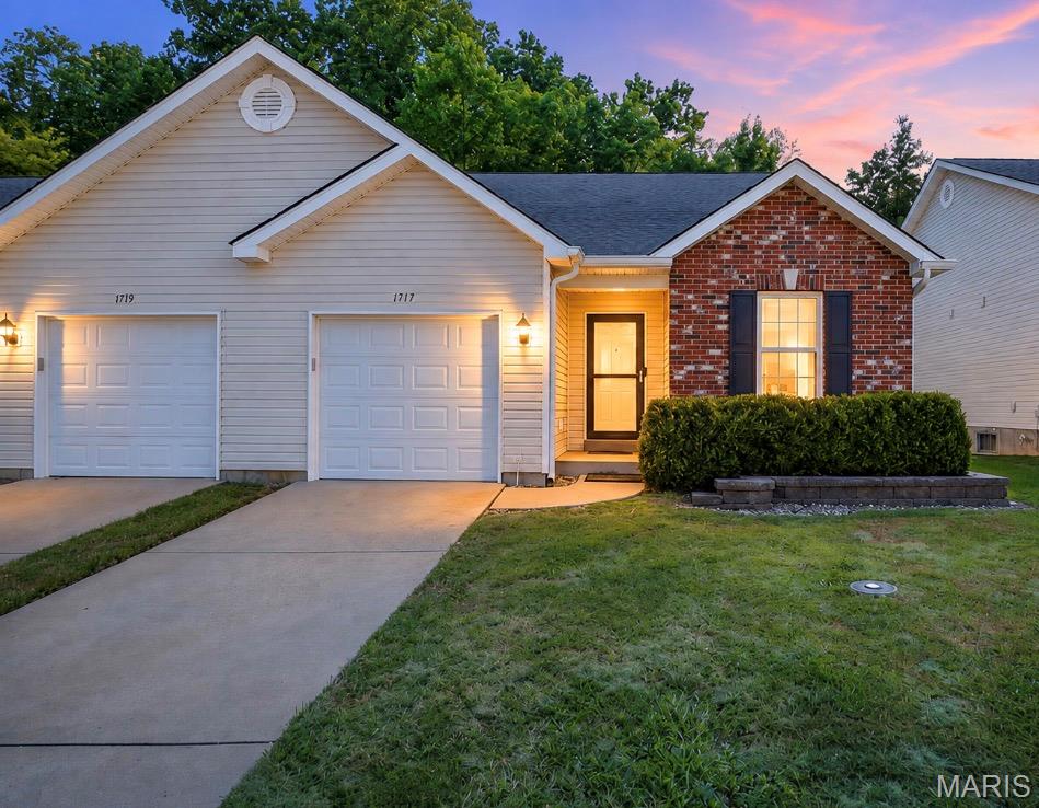 Time to enjoy a more carefree lifestyle! Imagine coming home without having to worry about the outside yard work, spending summer days at the community pool, and inviting family and friends over to enjoy it—all while someone else takes care of the maintenance. This well-maintained 2-bedroom, 2-bath villa offers an inviting open floor plan designed for comfortable, easy living. The spacious family room features vaulted ceilings and glass doors leading to a covered deck overlooking the private, level backyard—perfect for morning coffee or relaxing at the end of the day. The well-equipped kitchen offers plenty of workspace and a pantry for additional storage. Convenient main-floor laundry and an attached one-car garage make everyday living even easier. The primary bedroom features a private full bath and walk-in closet. A second bedroom is located at the front of the home near the additional full bath, providing a nice sense of privacy for overnight guests. The full unfinished basement offers plenty of possibilities for future living space and includes an egress window and rough-in for an additional bath. Excellent location just minutes from restaurants, shopping, and highway access. Villas offering this combination of low-maintenance living, community amenities, and a great location don't come along often—schedule your showing today!