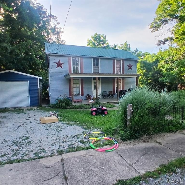 This beautiful late-1890s home captures the timeless character and craftsmanship of its era while offering the space and setting buyers love. Featuring 4 bedrooms and 1 bathroom, it provides plenty of room for family, guests, or a creative remodel vision.

Sitting on a nice, well-kept lot in Arcadia, the property includes a detached metal garage—perfect for vehicles, storage, or a workshop—and an additional shed for even more utility. The home’s classic architecture, and historic charm make it a standout opportunity in the Arcadia Valley.

Whether someone is looking for a full-time residence, an investment property, or a historic home to restore and make their own, this property offers the character, location, and potential that are hard to find today. This home could use some updating, but a lot of the hard work is complete. Metal roof on the entire home with the largest part being brand new! 

This home does have central air but the upstairs 2 bedroom are not served by the outside unit!