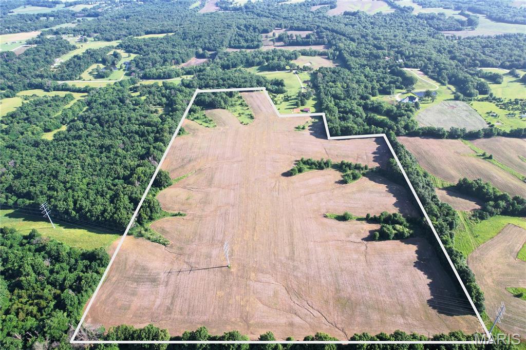 54.2 acres located southeast of Kirksville in Adair County, Missouri. This property features approximately 30 tillable acres currently leased through 2026 at $160 per acre cash rent, providing immediate income. Access is by recorded easement off Seven Oaks Lane, with electric and water available along the gravel road. The balance of the acreage offers some wildlife habitat and recreational opportunities, and the property was previously leased for hunting. Whether you're looking for an investment tract, hunting property, or future building site, this farm offers multiple potential uses. Must call before viewing!