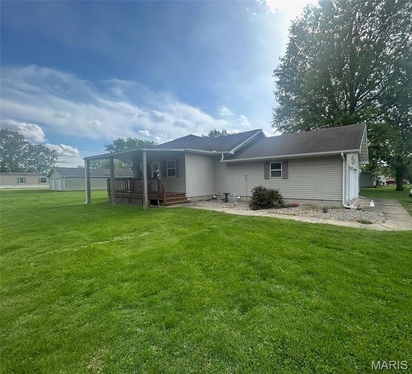THIS 3 BEDROOM , TWO BATH HOME SITS ON A LARGE CORNER LOT. STAINLESS STEEL APPLIANCES STAY ALONG WITH WASHER AND DRYER.TWO CAR ATTACHED GARAGE. ANOTHER GREAT FEATURE FOR THE INDIVIDUAL WHO HAS A LOT OF BIG TOYS IS AN ADDITIONAL 30 X 40 GARRAGE WITH A FINISHED AREA THAT FEATURES A HEATING UNIT, A/C UNIT AND A FULL BATH. REAL ESTATE TAXES WITH OWNER OCCUPIED ONLY ARE ESTIMATED AT $3518.00