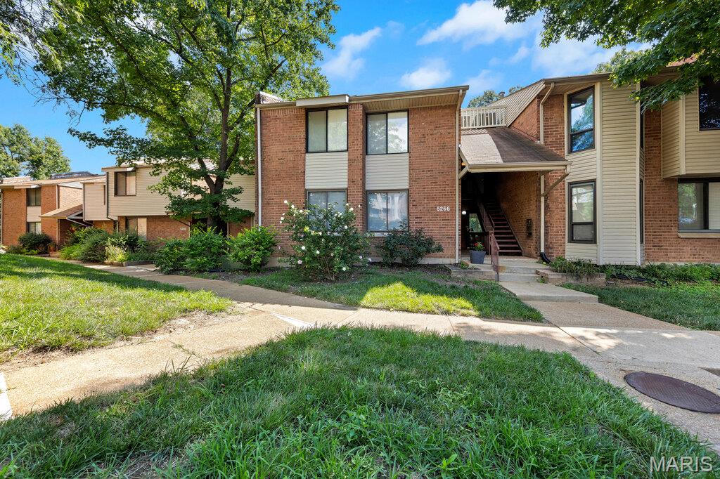 Here is the kind of remodel that buyers are looking for! Step inside and see the difference immediately with all new LVP flooring throughout, and brand new sliding glass doors to a walk out deck. Continue up the stairs to see a newly carpeted loft that receives plenty of natural light coming up through the main living area. Perfect for a home office or extra living/recreation area. The kitchen continues to impress with brand new quartz countertops, stainless steel appliances, cabinets, and tile backsplash all installed. The full bathroom has been entirely renovated as well with new tiling, vanity, and new fixtures. The deck has been newly refurbished, and features a beautiful view of the wooded lot out back! This is a perfect spot for morning coffee, relaxing evening meals, or bringing your own vision to create an incredible outdoor space! Finally, a brand new air conditioning system was installed as well. All utility fees, besides electricity (Ameren), are included within the association fee!! The property features a gorgeous private pool out back that is also provided by the association. This move-in ready home is where value and opportunity meet. You get the full renovation with unique property features that will be hard to find elsewhere. Schedule your showing today and come experience it for yourself!