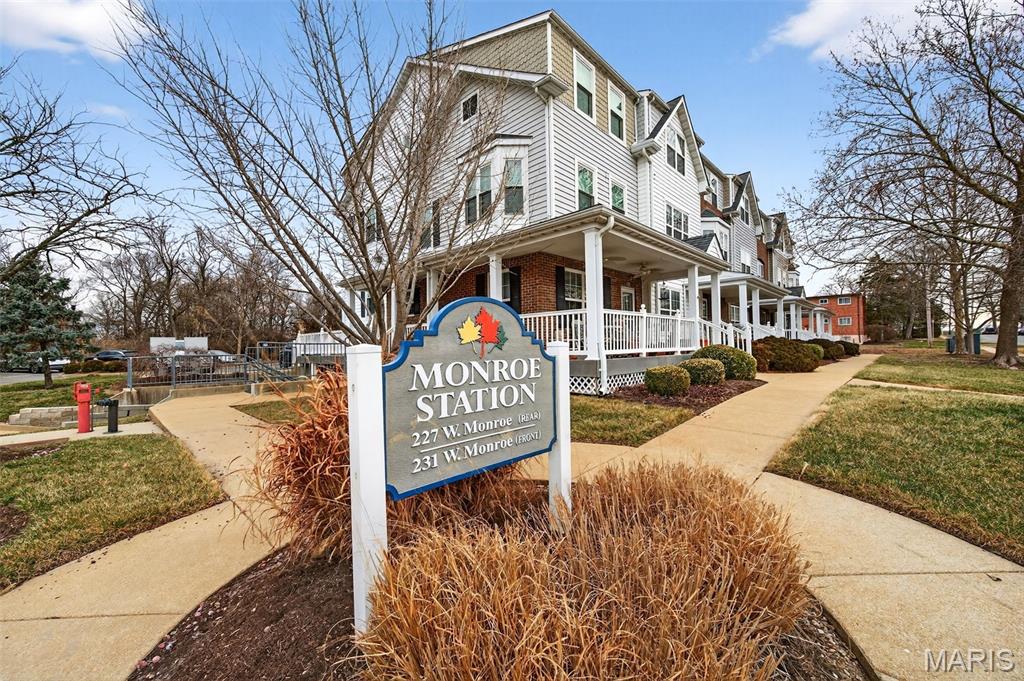 LOCATION, LOCATION, LOCATION. Rarely Available Main floor, one level, corner townhouse at Monroe Station just steps from Downtown Kirkwood. The open floor plan features large living and dining rooms and a beautiful kitchen with granite countertops, stainless steel appliances, upgraded cabinets and a center island. Down the hall you’ll find the large primary suite with full bath, guest bedroom, half bath, in-unit laundry, and large walk-in storage closet. The Side door opens directly onto the community patio/BBQ area. One premium parking spot in the underground garage with room for additional storage. Large parking lot with additional parking for owners and guests. Feels more like a home with private front and back doors and a large covered front porch. Small private patio in back. Accessible entry. NEWER Flooring. Updated Lighting and Fixtures. NEW HVAC 2024. NEW ROOF 2022. NEW WINDOWS 2024. WALK to Shopping, Dining, Nightlife, and ALL that DOWNTOWN KIRKWOOD has to offer.