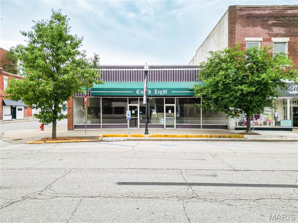 Prime Commercial Opportunity in Downtown Moberly: Over 6,000 Sq Ft!! Don't miss this rare opportunity to own or lease a highly visible commercial space in the heart of downtown Moberly. With over 6,000 square feet, this property offers a flexible open-concept layout, plus a rear warehouse space with convenient alley access for loading and deliveries. This gem also includes a new roof and existing HVAC system! Whether you're looking to launch, relocate, or expand your business, this location offers high traffic, excellent visibility, and is just 30 minutes from Columbia! Build-to-suit options are available (pricing may vary with buildout), making it ideal for retail, office, showroom, gym, restaurant or mixed-use concepts.

Moberly is known for its supportive, tight-knit community and pro-business environment all with affordable commercial pricing. Downtown grants may able to available! OFFERED FOR SALE OR FOR LEASE! Take advantage of this amazing chance to grow your business in one of Moberly's most recognized locations!