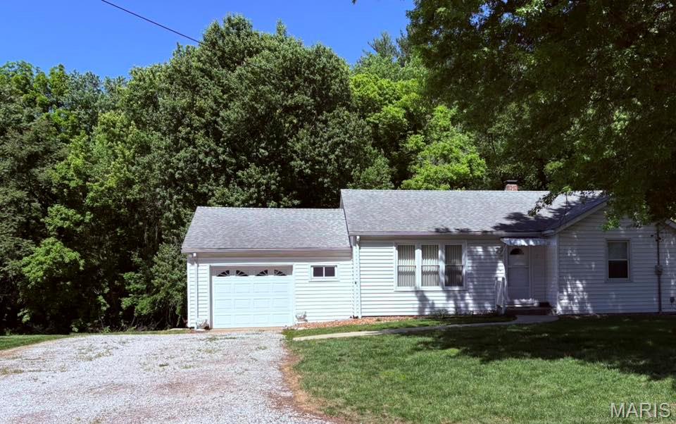 Welcome home to 2921 Old Caseyville Rd. in Swansea! This charming 2-bedroom, 1-bath home offers 978 square feet of comfortable living space with hardwood floors and a warm, inviting feel throughout. Plus don't forget the full unfinished basement! Nestled on a lot that backs to a peaceful tree line, you’ll enjoy added privacy and a relaxing backyard setting.
The family room provides plenty of room to gather, while the well-maintained condition of the home makes it easy to move right in and add your personal touch over time. Conveniently located in a highly desirable school district, this home is a wonderful opportunity for first-time buyers, downsizers, or anyone looking for a cozy place to call home. This home is being sold as-is however don't let that worry you! Home has newer roof, ac(2017), hvac(2017), and water heater(2017). 
Affordable, well cared for, and located in the heart of Swansea — don’t miss your chance to make this one yours!