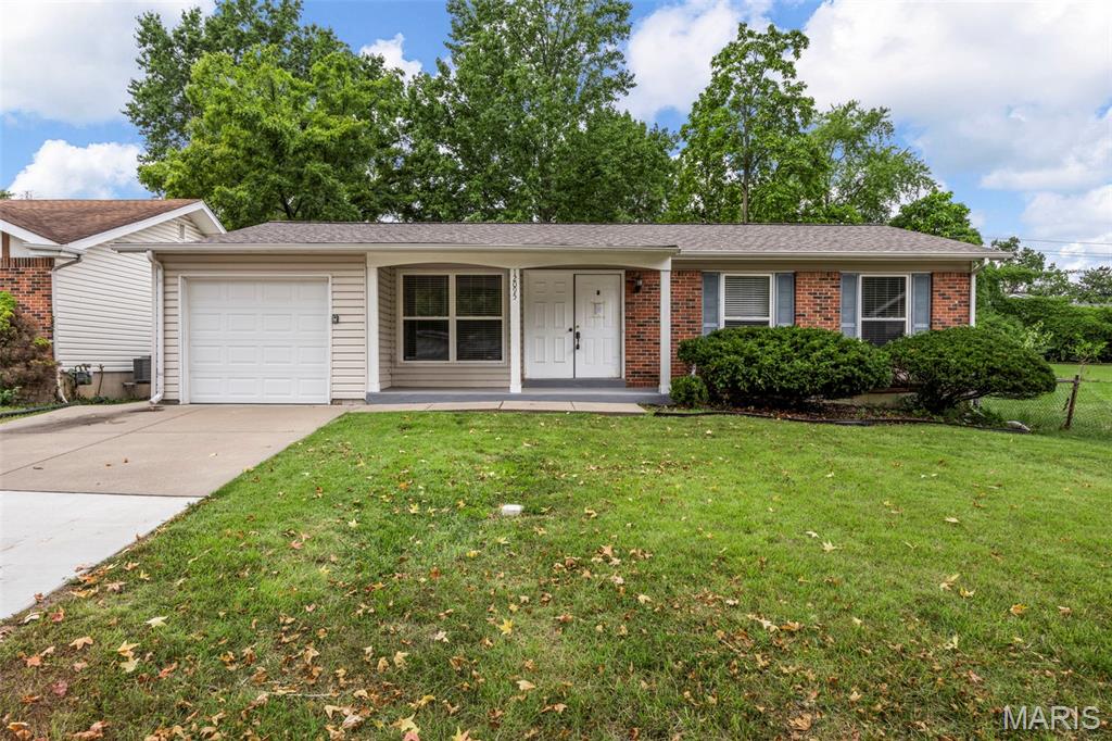 Nicely updated 3 bed, 2 bath ranch style home with 1088sf and 1-car attached garage.  Kitchen has updated cabinets, granite countertops, and a full compliment of stainless steel appliances. Home has newly installed laminate flooring throughout and is freshly painted.  Newer HVAC, water heater, electric panel and architectural roof. Large fenced backyard and patio area for entertaining.  Basement is unfinished and has laundry area.  This is a must see home.  Closing cost assistance may be available if buyer elects to use the seller’s preferred lender.