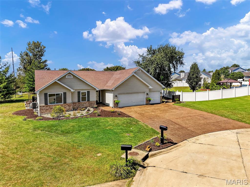 Welcome home to this inviting 3-bedroom, 2-bath ranch tucked away on a cul-de-sac in the Wentzville School District, where the backyard is sure to be the feature everyone remembers! From the moment you open the front door, your eye is drawn through the home to the incredible outdoor space beyond. Step into the light-filled living room featuring a beautiful fireplace and an inviting layout that flows effortlessly into the kitchen and dining areas. The kitchen offers a breakfast bar and cozy breakfast nook, providing plenty of space for friends and family to gather. Double doors lead directly to the back patio and pool, while the dining room offers another beautiful view of the backyard.
The spacious primary suite welcomes you through French doors and features a tray ceiling, abundant natural light, and a private en-suite bath complete with double sinks, a soaking tub, separate walk-in shower, and an 8x6 walk-in closet. Two additional bedrooms are located toward the front of the home and offer plenty of natural light, with a full hall bath featuring a shower and granite countertop nearby. A convenient main-floor laundry room leads directly to the 3-car garage, where a pegboard wall with adjustable shelving provides fantastic organization for tools, equipment, and more.
But the true showstopper is outside! The expansive backyard was made for summer days, weekend get-togethers, and evenings spent outdoors. At the center is an in-ground walk-in pool featuring charming mosaic tile animals and a fountain, surrounded by a spacious concrete patio with plenty of room for lounging, dining, and entertaining. Beyond the pool, the generous yard provides even more room to play, relax, set up outdoor games, or enjoy a hammock with posts already in place.
An unfinished basement provides even more space and endless possibilities for future finishing, recreation, hobbies, storage, and more. With a cul-de-sac location, Wentzville School District feeding into Liberty High School, 3-car garage, ranch-style living, and an unforgettable backyard retreat, this home offers a combination that's hard to find. Your backyard paradise is waiting—don't miss out, schedule your private showing today!
