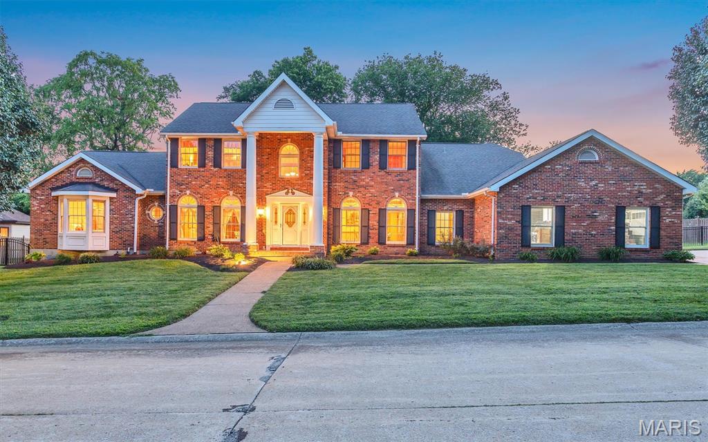 **OVER 7,500 FINISHED SQ FT! MASSIVE ADDITION! PRIVATE HALF-ACRE LOT!** You may have never even thought about moving, and then this gem came across your screen, and now you are packing your bags!.  It is a RARE opportunity to find this size of house in this premium location on a private street in Sunset Hills. The dramatic two-story entry foyer welcomes you with gorgeous porcelain flooring that flows into the spacious dining room. The sitting room features its own wet bar, which will be a crowd-pleaser.  The back living room showcases soaring ceilings, skylights, and a gas fireplace to cozy up to. The kitchen offers a new stainless-steel LG refrigerator, newer Bosch oven and microwave, a large pantry, and a breakfast bar. **And then there’s the addition!** Adding more than 1,100 square feet to both the main level and lower level, this incredible expansion is a true showstopper. It features a vaulted ceiling, stunning wall of windows, beautiful hardwood floors, and entertaining space galore. The main-floor primary suite is a private retreat with a spacious bath and large walk-in closet complete with custom organizers. Two half baths and a laundry room complete the main level. Upstairs, three spacious bedrooms and two full baths provide plenty of room for family and guests. The lower level is almost an entire destination of its own! The addition was specifically engineered with a custom beam designed to eliminate support posts, creating a wide-open space and eliminating anything blocking the big game!. You will need to polish up on your bartending skills for your new awesome custom bar.  Your friends will also love the high-end A.E. Schmidt pool table that the sellers are leaving.  Two additional rooms offer endless possibilities for either office, a home gym, a craft room, or just a quiet escape.. Two cozy family-room areas feature beautiful glass cabinetry, wood shelving, a gun safe, and pistol drawers. The lower level also features another full bath and a large storage room. Step outside to the large patio and enjoy the privacy of the beautifully level backyard. This flat lot could easily accommodate a pool. New fencing has recently been added in the backyard and across the street to border that portion of the property. Brand-new landscaping was just completed this month. The oversized three-car garage checks another box off of your wish list.  It comes complete with new ultra-quiet garage doors and openers, plus a pull-down screen door on the double garage door. The seller is even willing to leave the new high-tech washer and dryer. Three zoned HVAC units, combined with the home's solid construction, help keep utility costs surprisingly low.  Call today to schedule your private tour before this gem is gone!