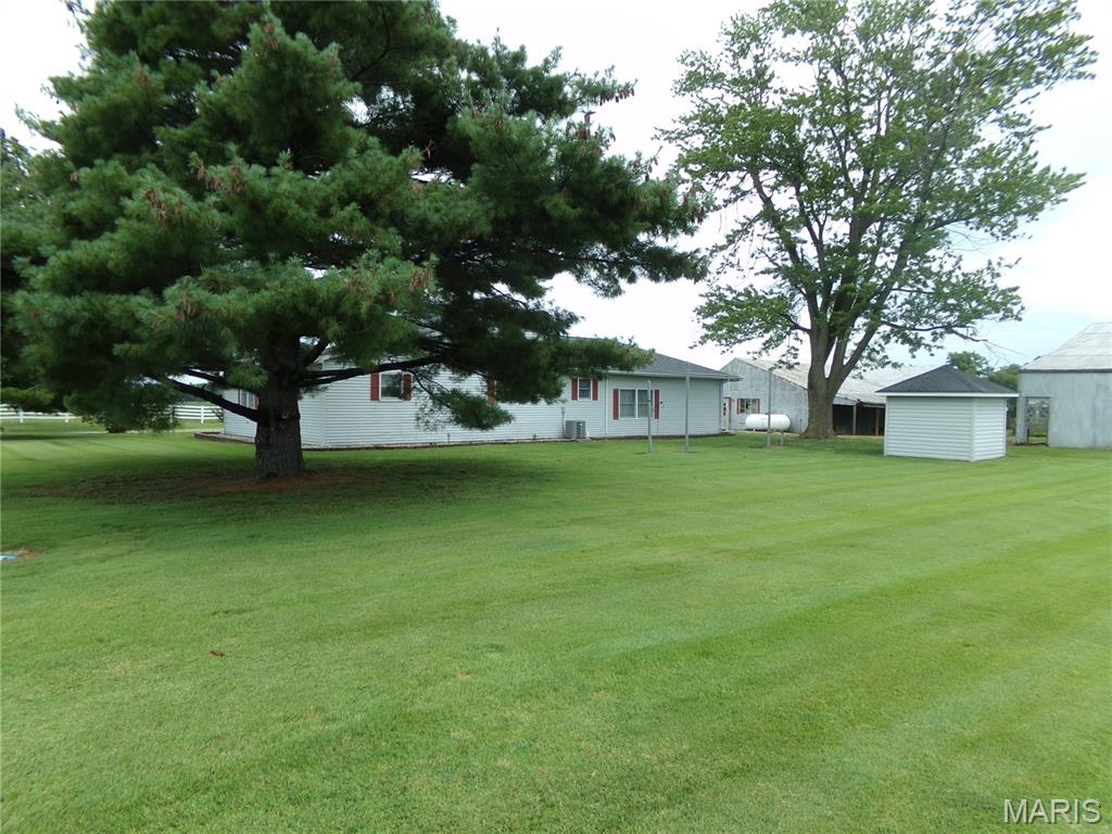 Looking for a place in the Country? Check this out, 2 bedroom home on 30 acres with fenced pasture, perfect for cattle or horses.  Along with the home there are 6 additional out buildings, grain bin,  2 car detached garage, and a well for watering your livestock. Don't miss out on this one, book your showing today.