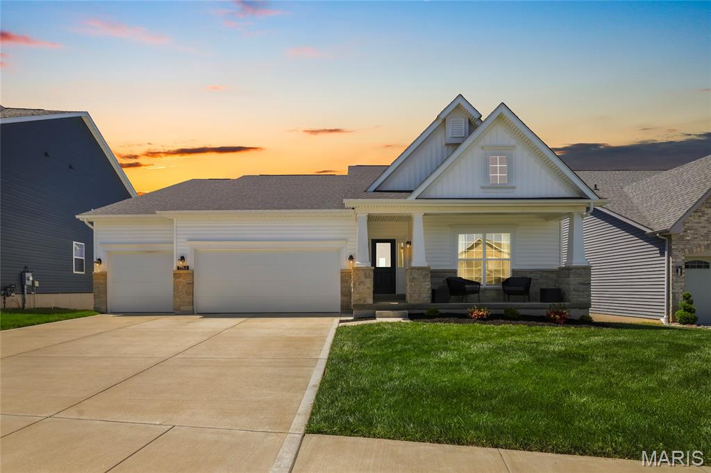 Step into showstopper status! This 2021-built Craftsman by Consort Home Builders checks every box; 4 bedrooms, 3 full baths, and a 3-car garage, all loaded with high-end upgrades.

From the moment you enter, soaring 11’ ceilings, oversized windows, and 8’ doors set the tone for elevated living. The open-concept layout with a split-bedroom design offers both flow and privacy, while top-tier LVP flooring runs seamlessly throughout the main level.

The expanded custom kitchen is a true centerpiece - featuring textured granite countertops, a gold-flecked backsplash, double oven, wine fridge, and a walk-in pantry with custom organizers (because yes, even your snacks deserve luxury).

The main living area stuns with a statement fireplace and walls of windows, flowing effortlessly into the breakfast room and dining room. Be sure to check out the back deck - where sunset views over the hills steal the show.

The primary suite is pure retreat - picture windows, a spacious walk-in closet with custom organizer, and a spa-inspired bath with soaking tub, bench shower, and room to unwind. 2 additional generously sized bedrooms and main floor laundry round off this space.

The cozy lower level doesn’t feel like a basement - it feels like a second main level. With full-size windows, and walk-out access, the space is bright, open, and built for entertaining. The massive wet bar (hello, ice maker + second wine fridge) anchors the rec room, complete with a built-in Sonos sound system. You’ll also find a versatile bonus room (office, studio, hobby room -you choose), a separate home gym, and an additional bedroom and full bath.

Outside, enjoy a beautifully maintained, fenced backyard and peaceful surroundings - just minutes from Downtown Eureka and Brookdale Farms, all within the highly regarded Rockwood School District and benefiting from Jefferson County taxes.

All major systems are just 5 years new, and the new owner can still take advantage of the transferable 10-year warranty - adding peace of mind to this already exceptional space. This isn’t just a home - it’s a lifestyle upgrade. Come see it before someone else claims it!