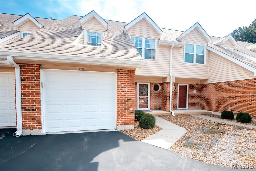 **Low-Maintenance Ballwin Townhome with Attached Garage & Community Amenities!**
Welcome to 1429 Tahoe Valley Court, where comfortable living and low-maintenance convenience come together in this well-maintained 2 bedroom, 2½ bath townhome. Located in a desirable Ballwin community, this home offers a spacious layout, great storage, private outdoor space, and amenities that make everyday living easy. The main level features a spacious living room with a cozy fireplace, creating a comfortable gathering space that flows into the dining area and kitchen. A convenient half bath is also located on the main level. The kitchen offers solid surface countertops, stylish tile backsplash, gas range, pantry, and plenty of cabinet space for storage. Upstairs, the generously sized primary suite offers a private en-suite bath and three closets, giving you exceptional storage space. A second bedroom, full hall bath, and convenient upper-level laundry complete the second floor. Step outside to your private patio overlooking a peaceful, park-like common area, without the maintenance of a large yard. The attached one-car garage provides convenient parking and additional storage, while abundant guest parking makes entertaining easy. The community amenities add even more value! Residents enjoy access to a clubhouse, swimming pool, and tennis courts, while the HOA takes care of water, sewer, trash, snow removal, landscaping, and exterior maintenance. That's truly low-maintenance living! Conveniently located near major highways, shopping, dining, parks, and everyday conveniences, this home puts you close to everything Ballwin has to offer while providing a peaceful place to call home. If you're looking for an updated, comfortable townhome with great amenities, minimal exterior maintenance, and a convenient Ballwin location, this one is worth a look!
**Passed occupancy inspection and ready for its new owner!**