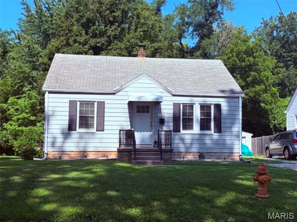 Adorable cottage-style home full of charm and character, located in a great North Alton neighborhood! From the arched details to the built-ins, this home has the cozy features buyers love, along with thoughtful updates throughout.

The spacious living room offers a welcoming place to relax, while the eat-in kitchen features updated cabinets, countertops, and newer appliances. 2 airy light filled bedrooms and a nice bath that is all updated.

Outside, you’ll love the large, private backyard that backs to the woods — perfect for relaxing, entertaining, gardening, or simply enjoying a peaceful view. The home also includes a one-car garage and a basement with laundry area and plenty of room for storage.

Important updates include a new furnace and water heater  in 2019, and a completely new sewer line in 2025, offering extra peace of mind. Charming, updated, and tucked into a wonderful location — this North Alton cottage is ready to welcome its next owner!